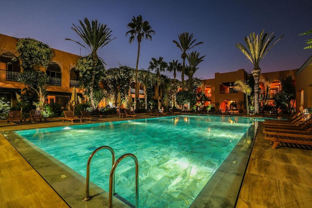Tikida Golf Palace Αγκαντίρ Εξωτερικό φωτογραφία The swimming pool at the hotel