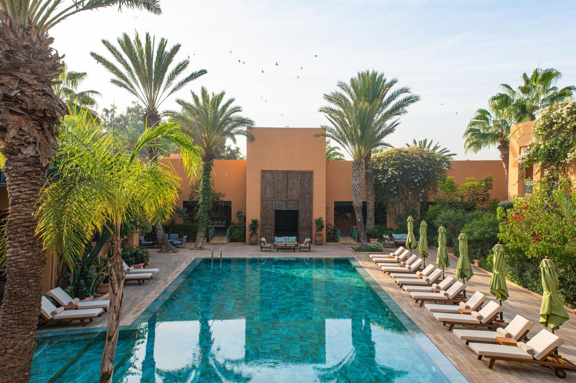 Tikida Golf Palace Αγκαντίρ Εξωτερικό φωτογραφία The swimming pool at the Ouarzazate hotel
